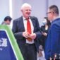 Participants in the Invest in Beijing Conference exchange views at the venue.
